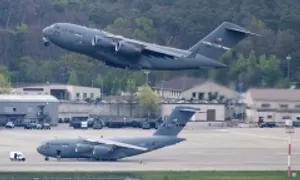 Đức đề xuất thay Mỹ trả lương cho 11.000 nhân viên Đức đề xuất thay Mỹ trả lương cho 11.000 nhân viên